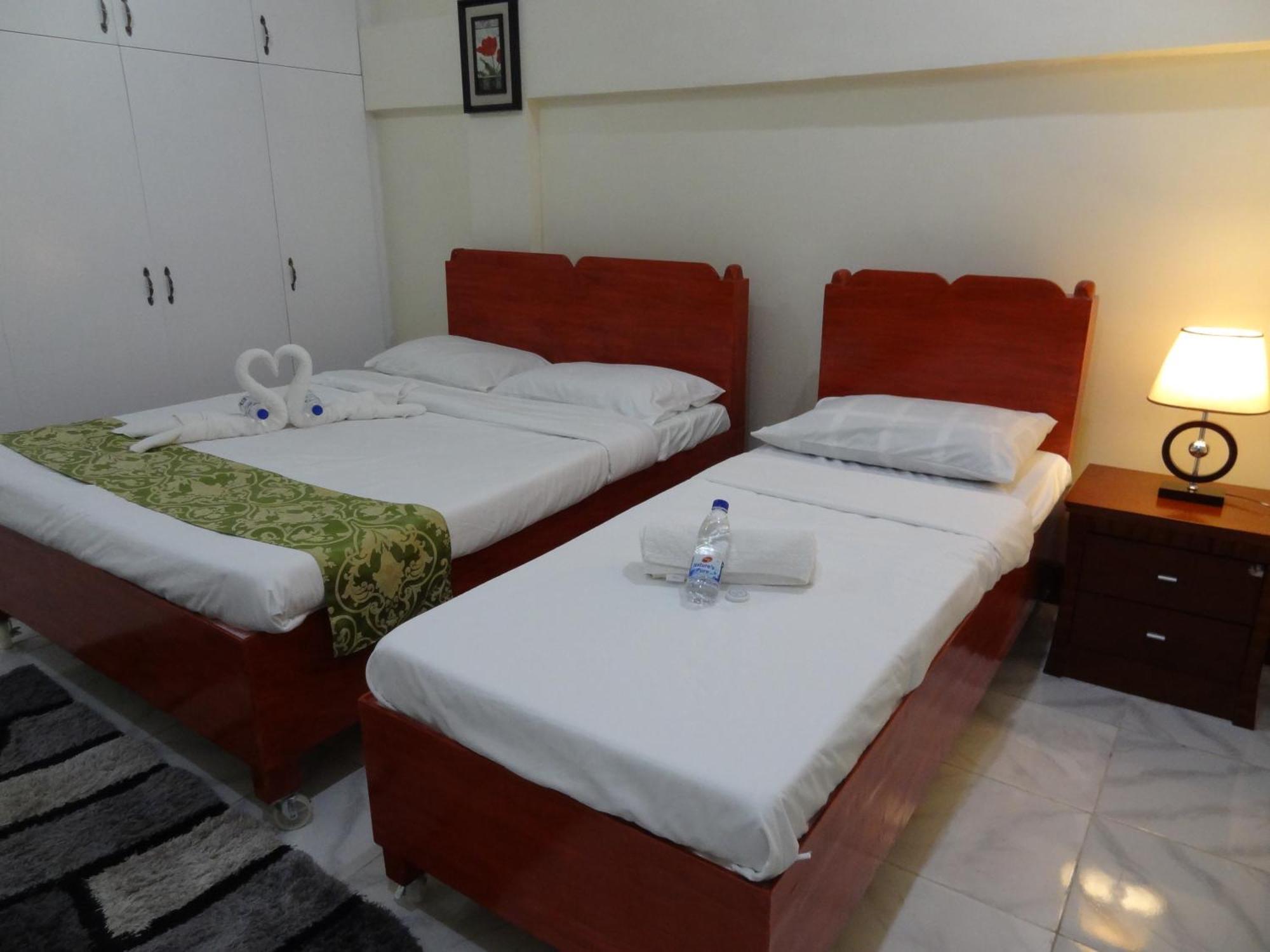 The Executive Villa Inn & Suites Davao Номер фото